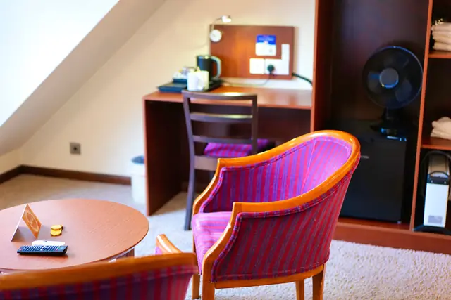 Writing desk and pink velvet armchair in the Royal Clifton Suite